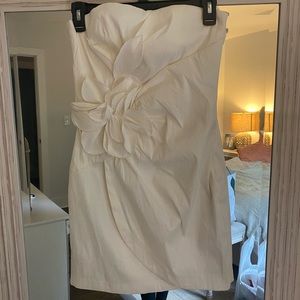 Strapless white dress with flower